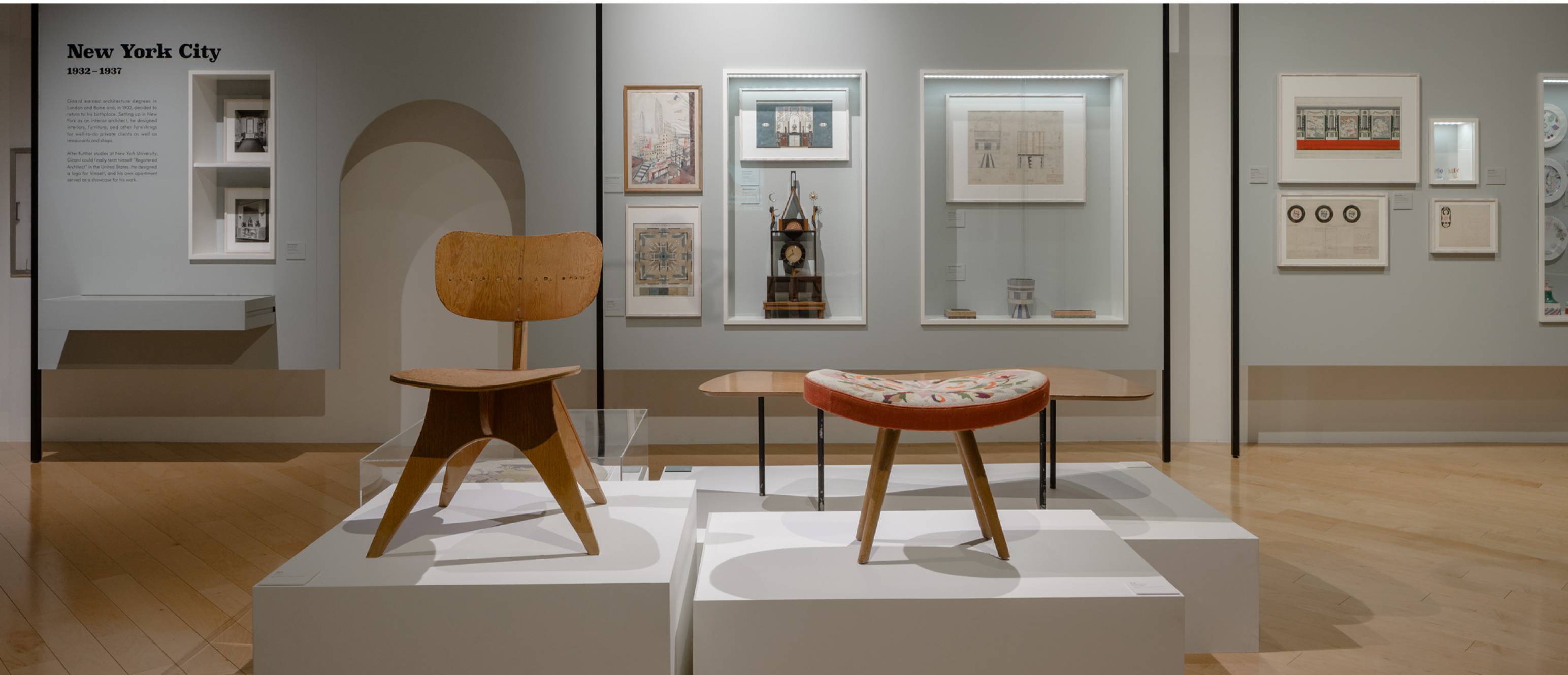 Alexander Girard exhibition, Prototype chairs and artworks in the back