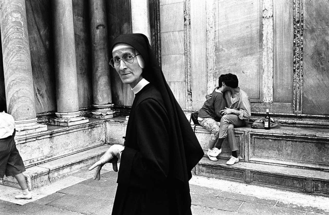 Donna Ferrato, Lovers + Holy Child Nun, Venice, Italy, 1986
