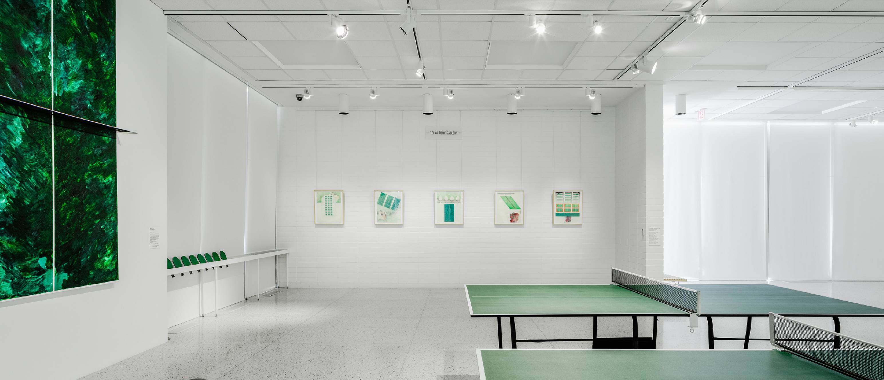 Ping pong tables, drawings and artworks in the gallery